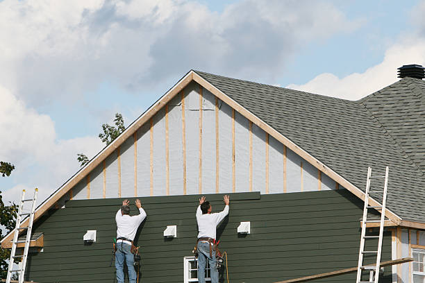 Professional Siding Replacement technician working in Etters, PA